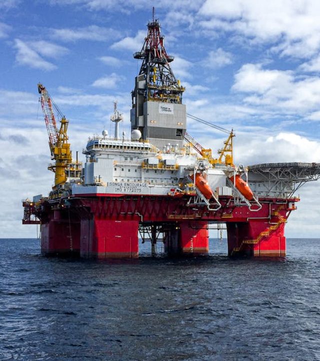 Majestic offshore oil platform under a bright sky in the North Sea, showcasing Norway's energy infrastructure.